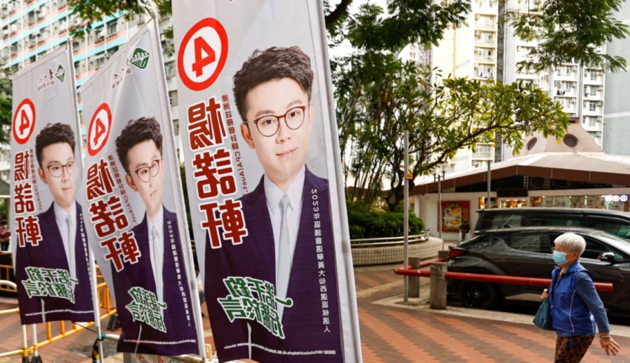 Election flags for a pro-Beijing candidate are being displayed on the polling day of the city's ''patriots-only'' District Council Election, amid crackdowns on democracy by Beijing, in Hong Kong, on December 10, 2023. No candidates from the democratic camps are being allowed to run in the election, while the Hong Kong government is also implementing Chinese-style patriotism education and has forced pro-democracy newspapers such as Apple Daily to close down. (Photo by Ceng Shou Yi/NurPhoto via Getty Images)