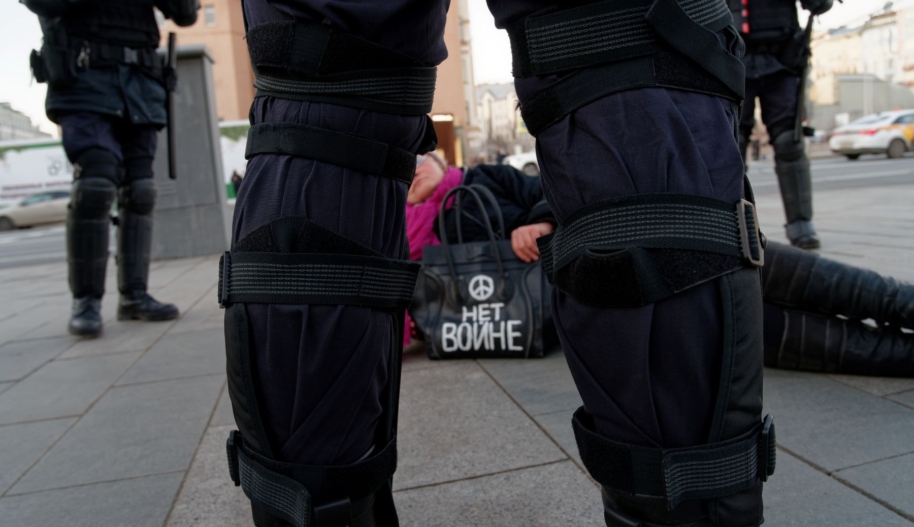 Anti war protester being arrested at the center of Moscow, in Moscow, Russia, on February 28, 2022 during a demonstration against the war on Ukraine. Photo by Daniil Danchenko/NurPhoto via Getty Images.