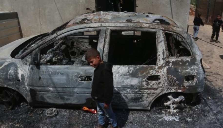 A view of heavily damaged car as Jewish settlers reportedly set fire to Palestinian homes and vehicles in Qusra town in Nablus, West Bank on April 14, 2024. Photo by Nedal Eshtayah/Anadolu via Getty Images.